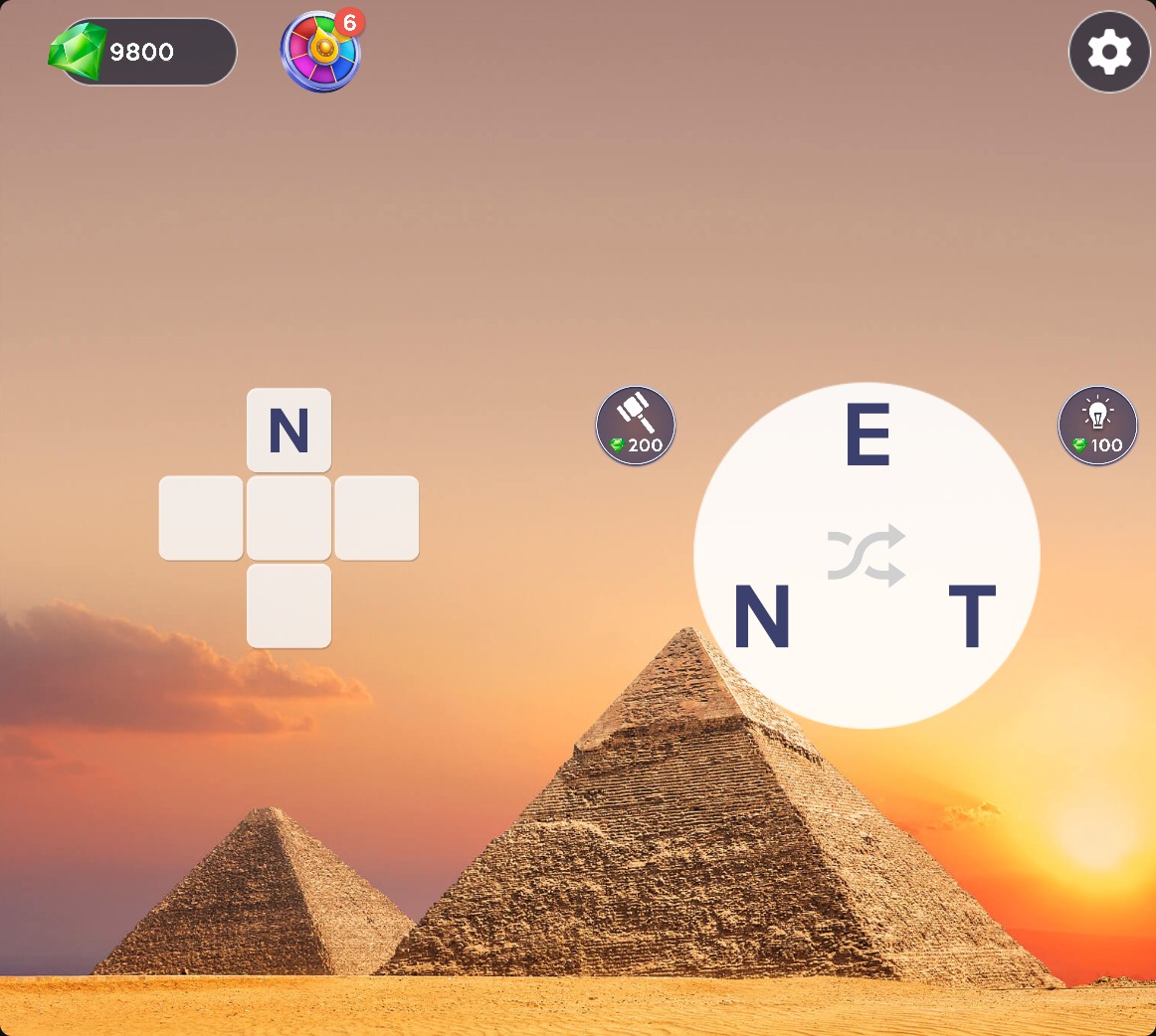 Words of Wonders puzzle with N revealed in the selected top tile and 9800 Gems after a hammer hint.