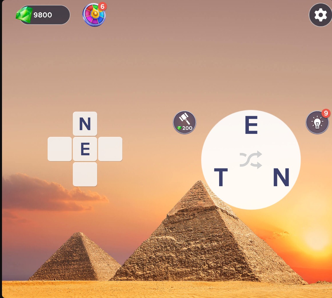Words of Wonders with N and E revealed, nine bulb hints remaining and 9800 Gems.
