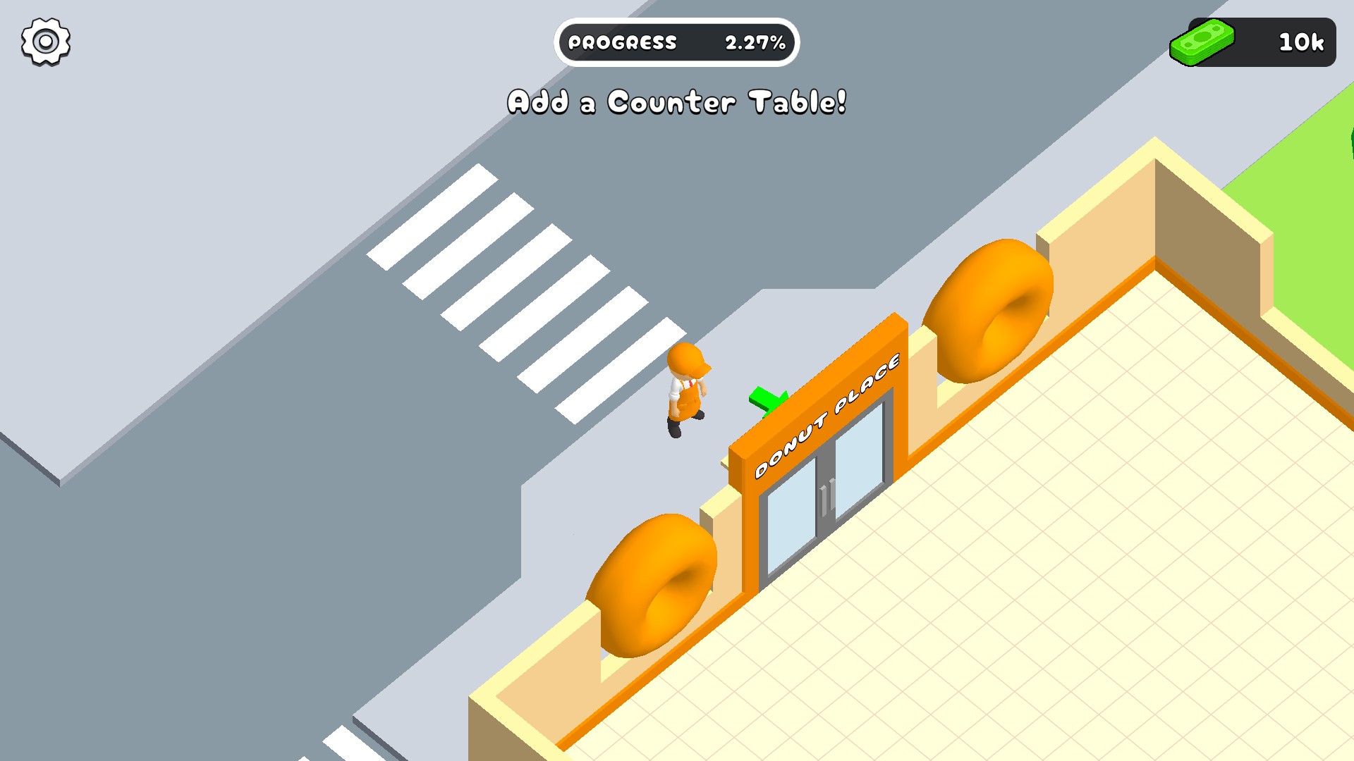 The player stands outside Donut Place with 10k cash in the HUD and the next counter table task shown.