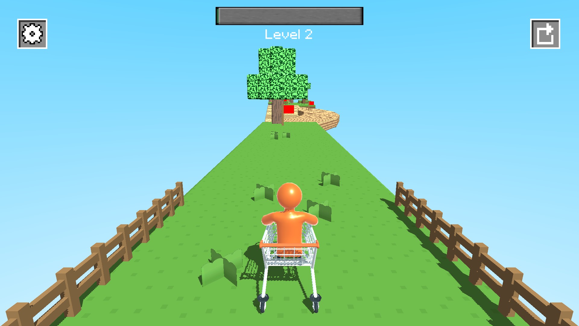 Orange rider in a shopping cart on Level 2's fenced course, with a tree and curved wooden track ahead.