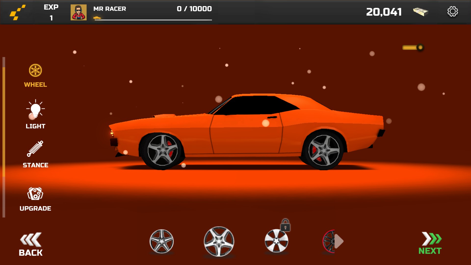 Orange Big Daddy car with silver five-spoke wheels in the MR RACER garage.